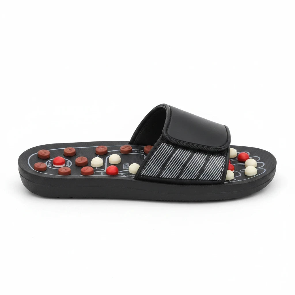EVEREASE acupressure slippers in black with adjustable velcro strap and red and white massage nodes for foot relief