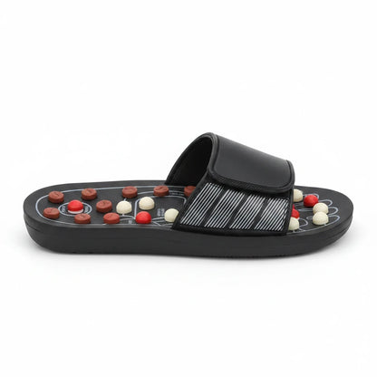 EVEREASE acupressure slippers in black with adjustable velcro strap and red and white massage nodes for foot relief