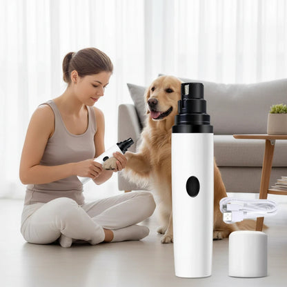 EVEREASE electric pet nail grinder being used by a woman to groom a golden retriever in a bright living room