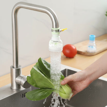 EVEREASE 360-degree rotating kitchen sink faucet sprayer attachment washing fresh greens in a stainless steel sink