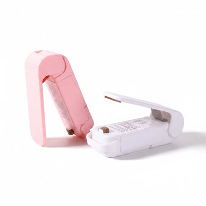 EVEREASE portable handheld plastic bag heat sealers in pink and white for keeping food fresh and airtight