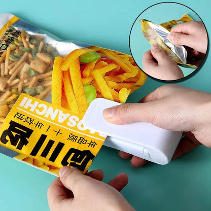 EVEREASE portable white handheld heat sealer creating an airtight seal on a snack bag to keep food fresh